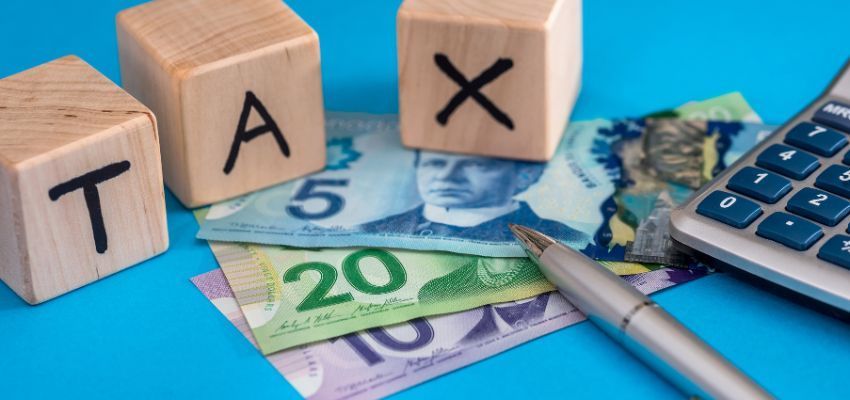 The blocks create the word Tax.