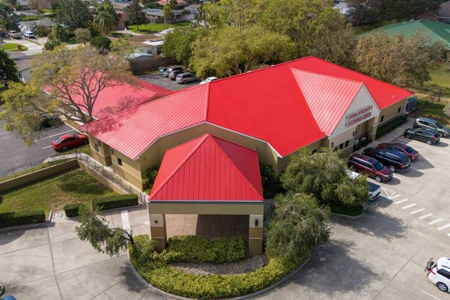 Metal roof servicing on a residence in Melbourne, FL
