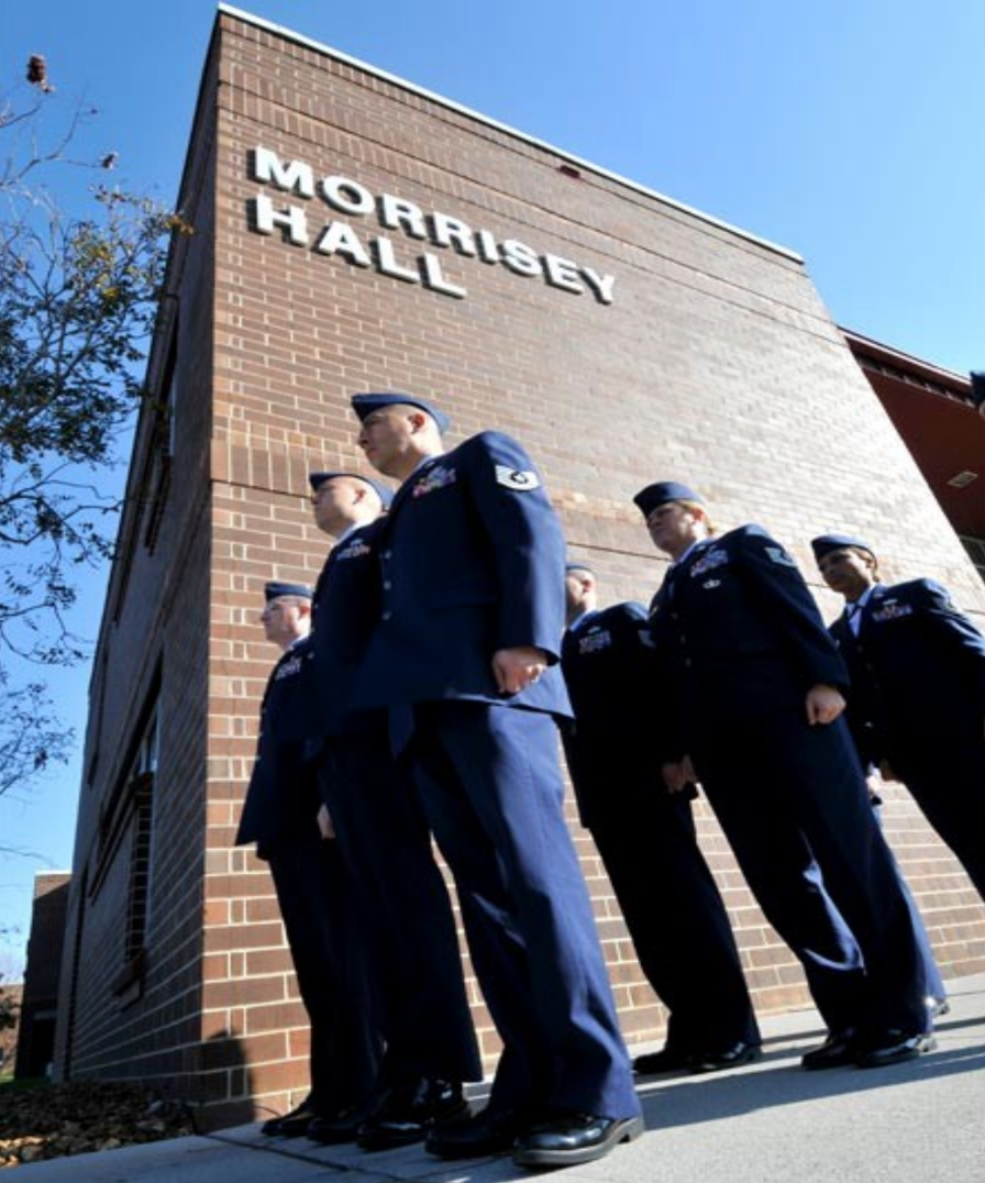 A group of men standing in front of morris hall