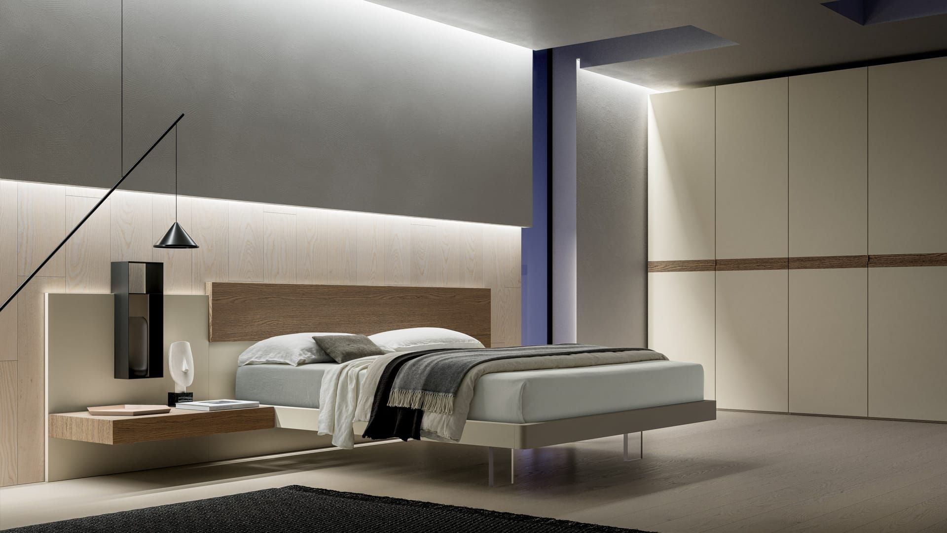 Una camera da letto con letto, comodino e armadio.