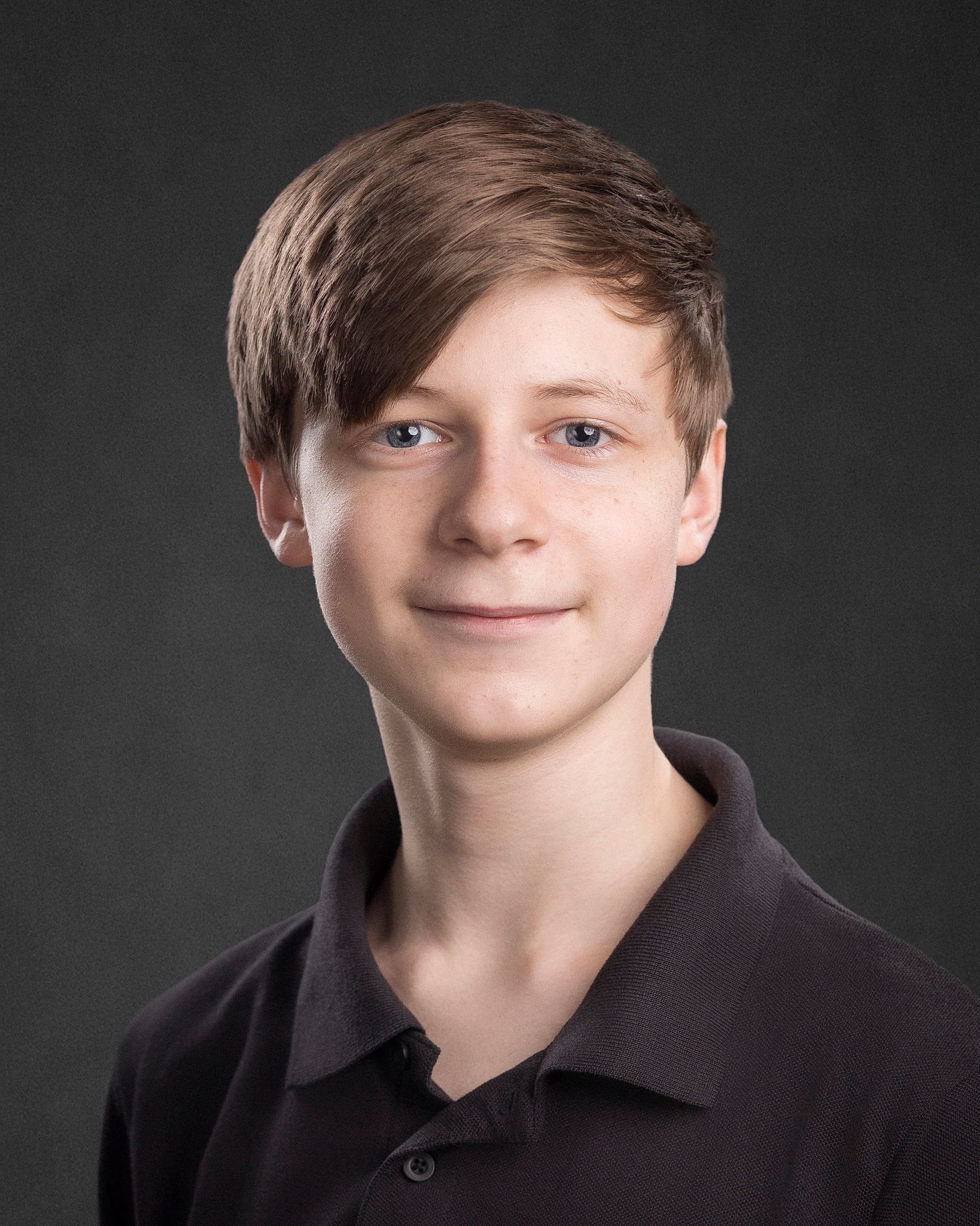 Professional homeschool student headshots taken on location for co-ops in Middle Tennessee. Clean, natural lighting portraits with a simple studio-style look.