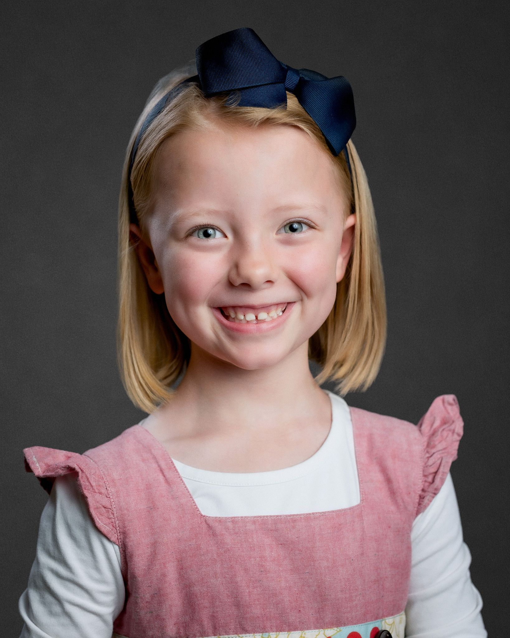 Professional homeschool student headshots taken on location for co-ops in Middle Tennessee. Clean, natural lighting portraits with a simple studio-style look.