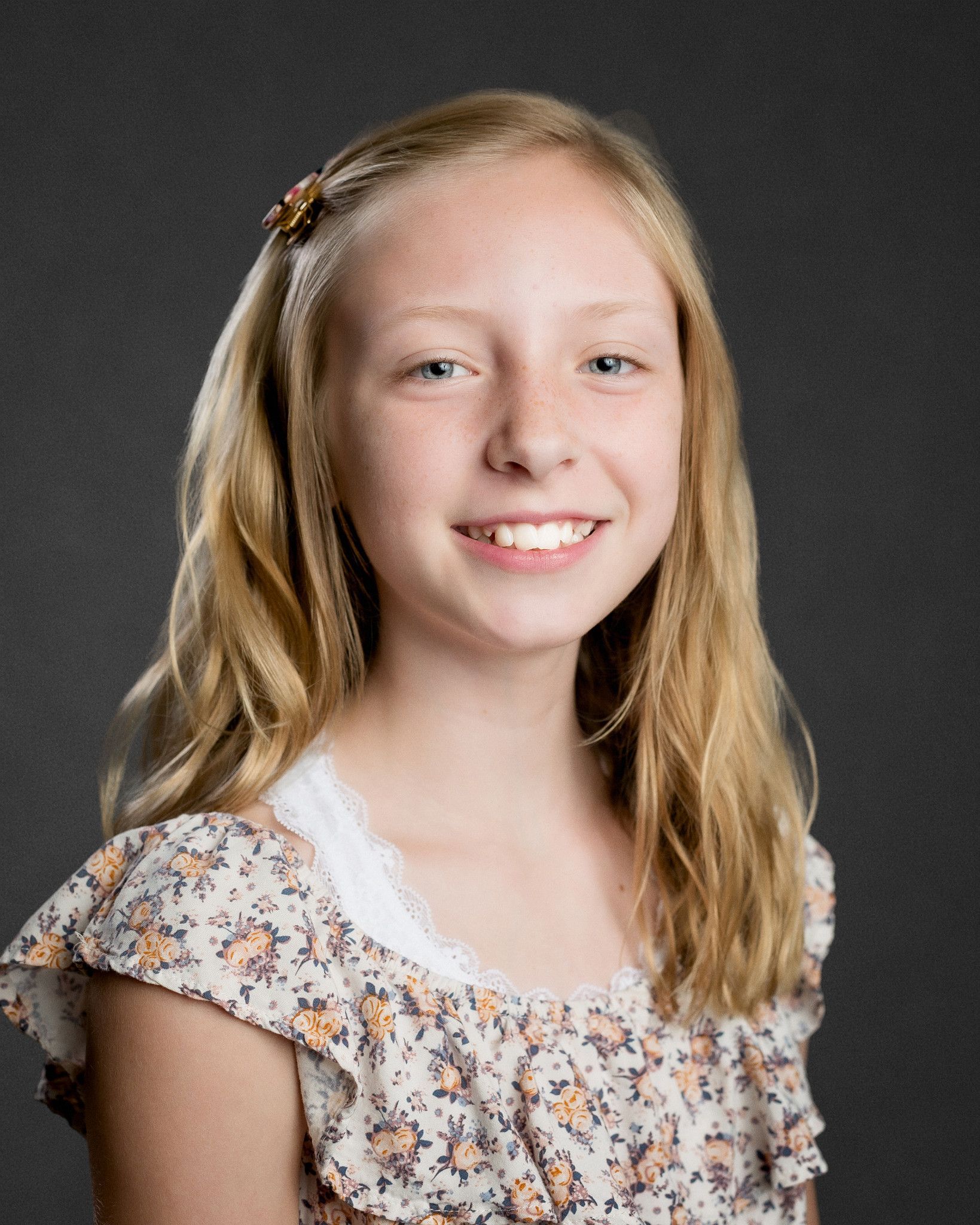 Professional homeschool student headshots taken on location for co-ops in Middle Tennessee. Clean, natural lighting portraits with a simple studio-style look.