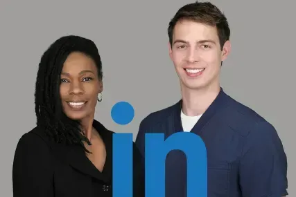 Two smiling professionals beside the blue LinkedIn logo on a gray background