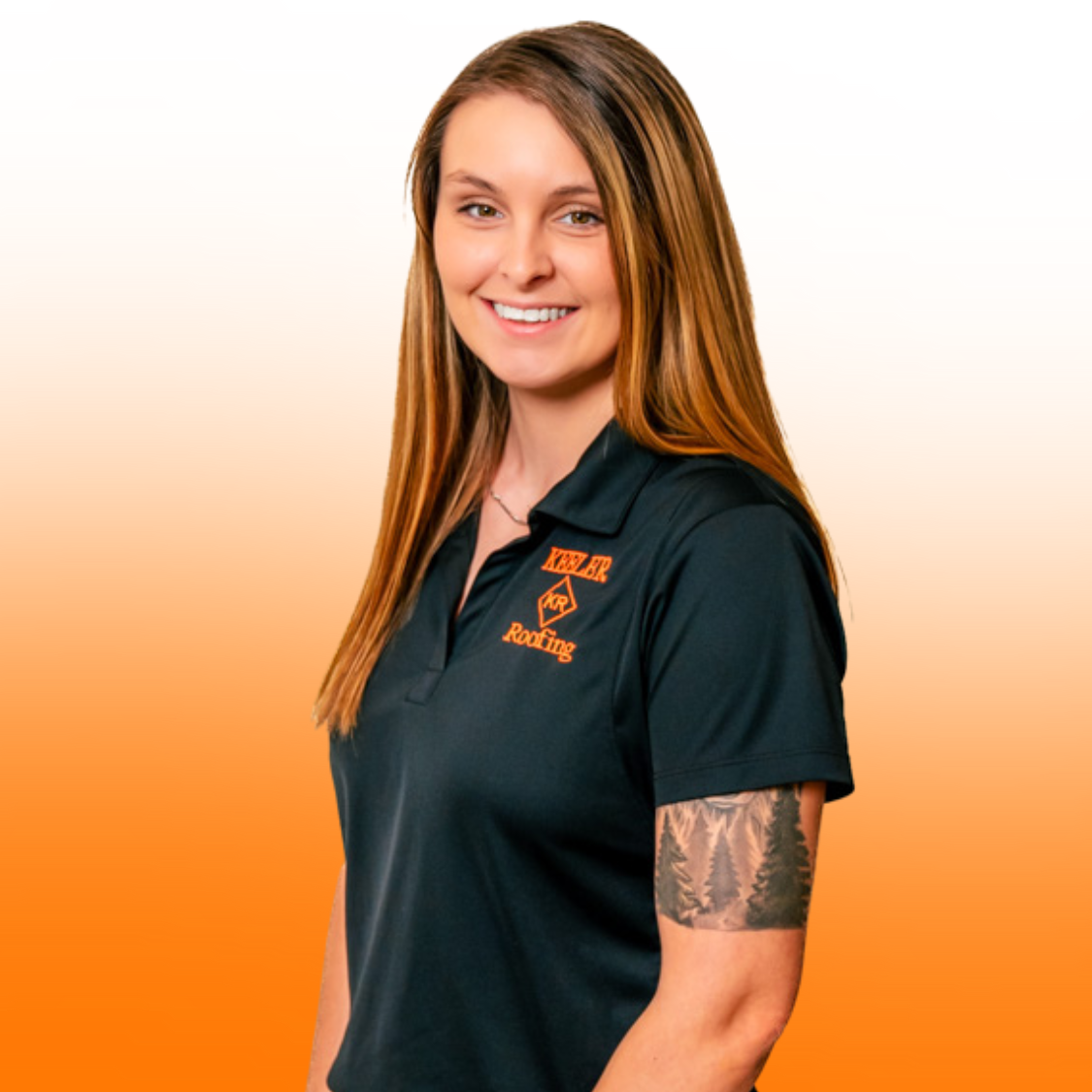 A woman with a tattoo on her arm is wearing a black polo shirt