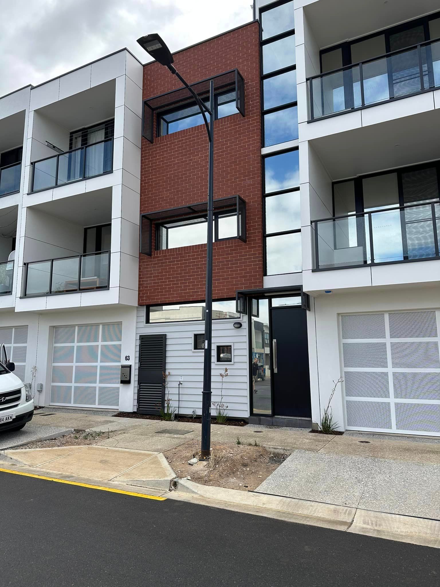 Building with Street Light & Tinted Windows — Enfield, SA — Scorpion Window Tinting