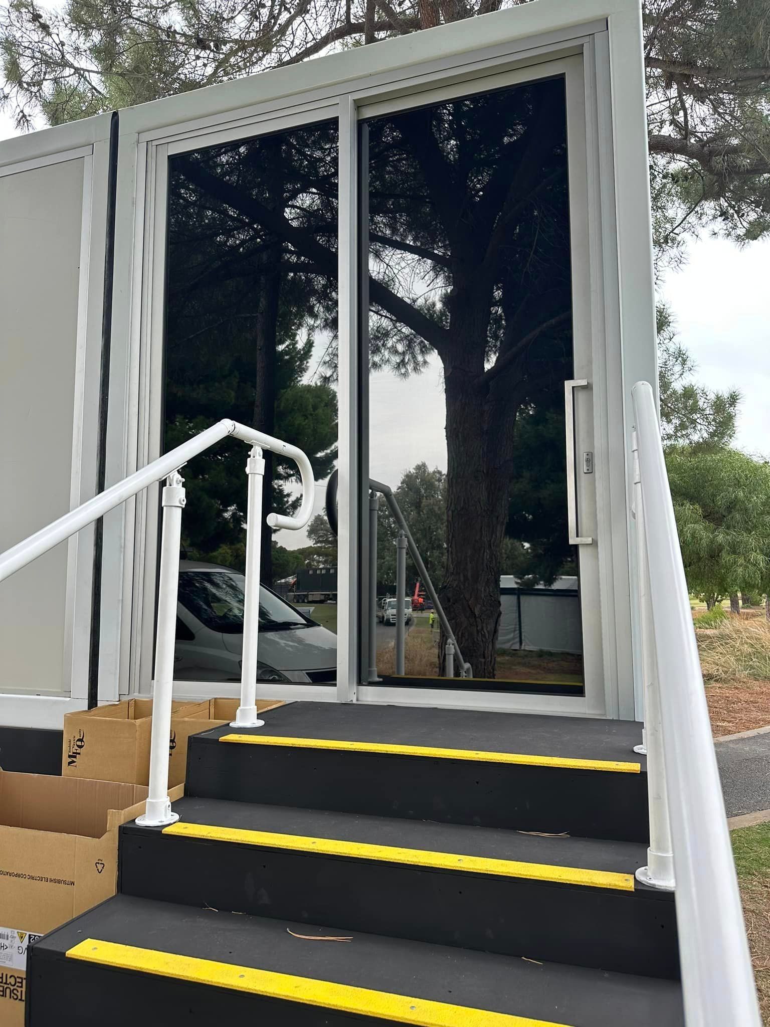 Stairs in Front of a Tinted Door — Enfield, SA — Scorpion Window Tinting