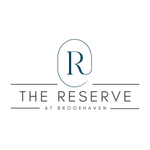 The Reserve at Brookhaven logo in teal and gray with a stylized R in a circle.