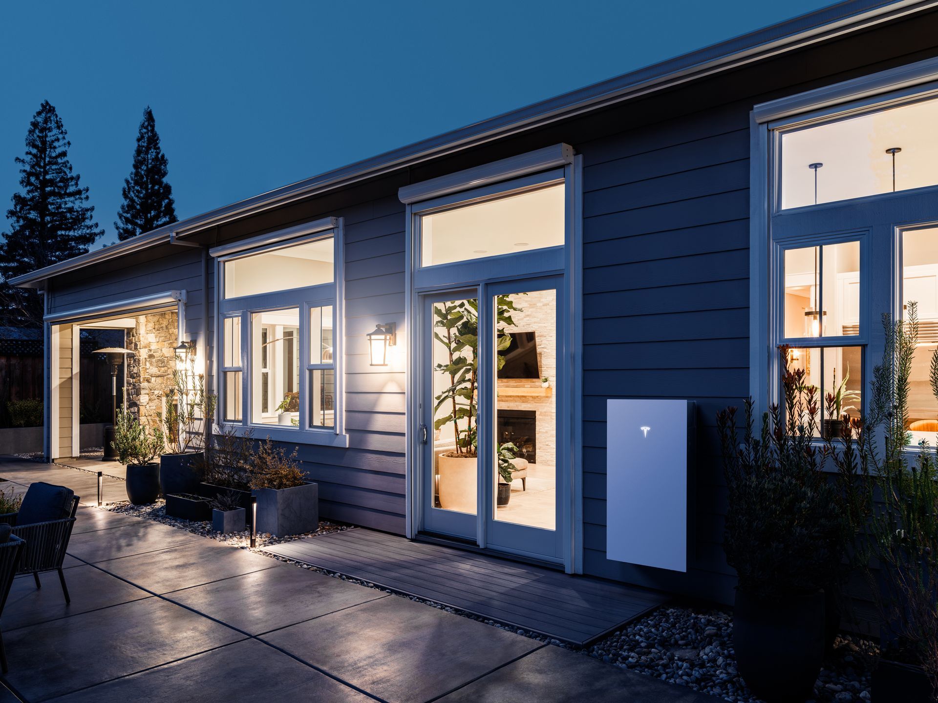 Evening view of a home protected by Tesla Powerwall backup