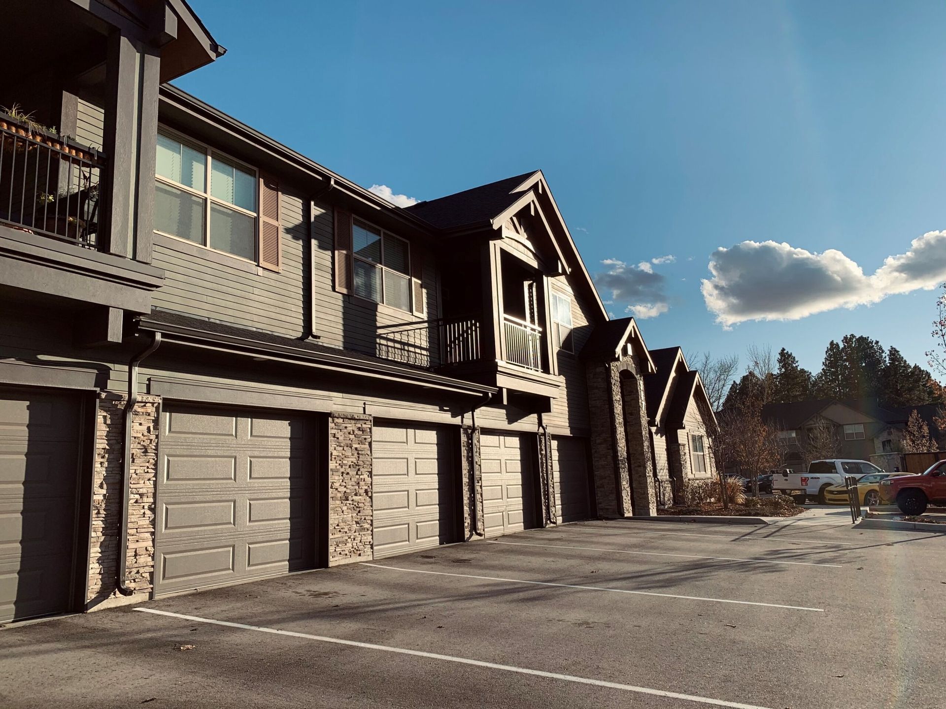 Apartment building with attached garages — Parkcenter Apartments