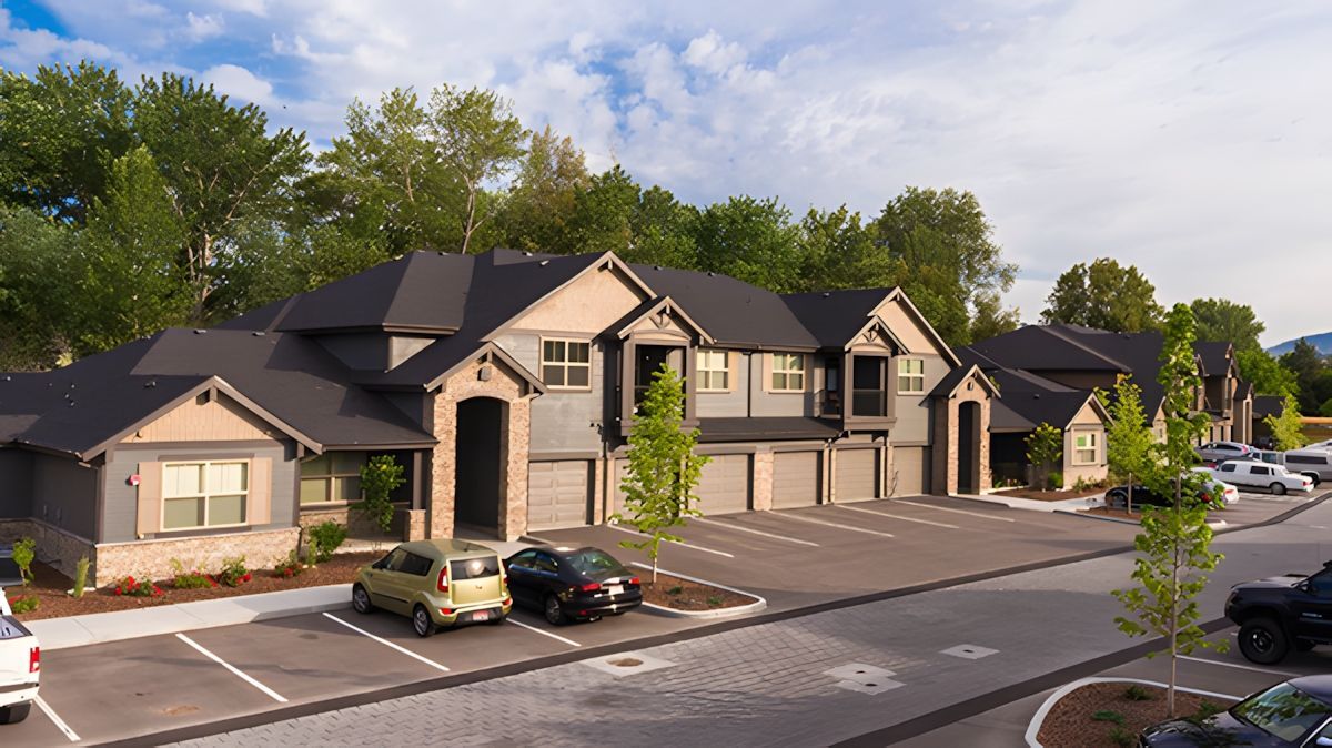 Apartment complex with gray buildings — Parkcenter Apartments