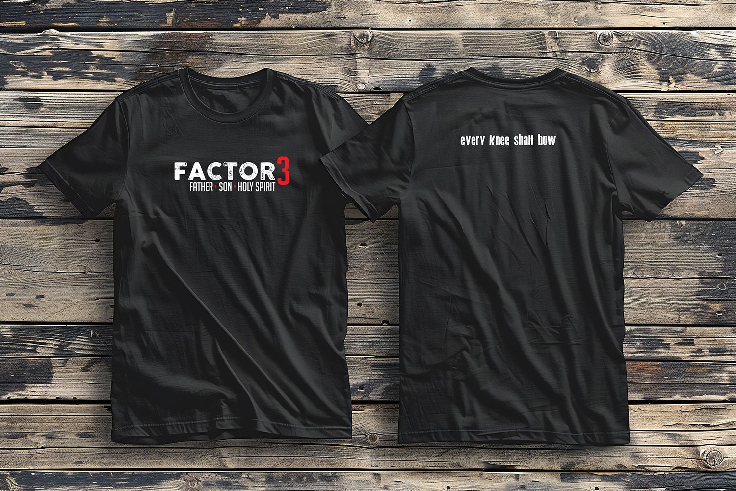 Black t-shirts, front and back, displayed on a wooden surface. Front says 