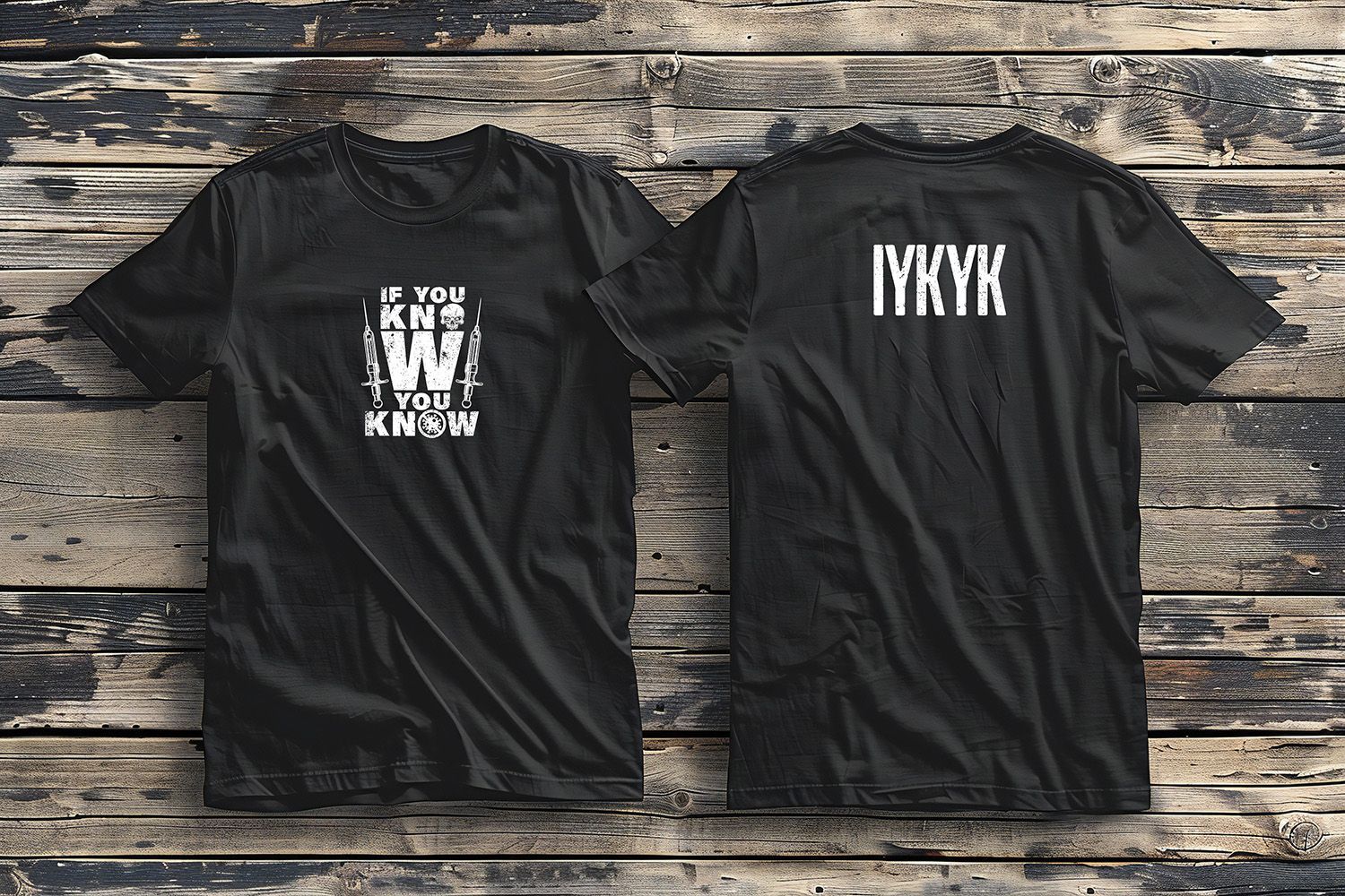 Two black t-shirts laid flat on a wood background. The left features 