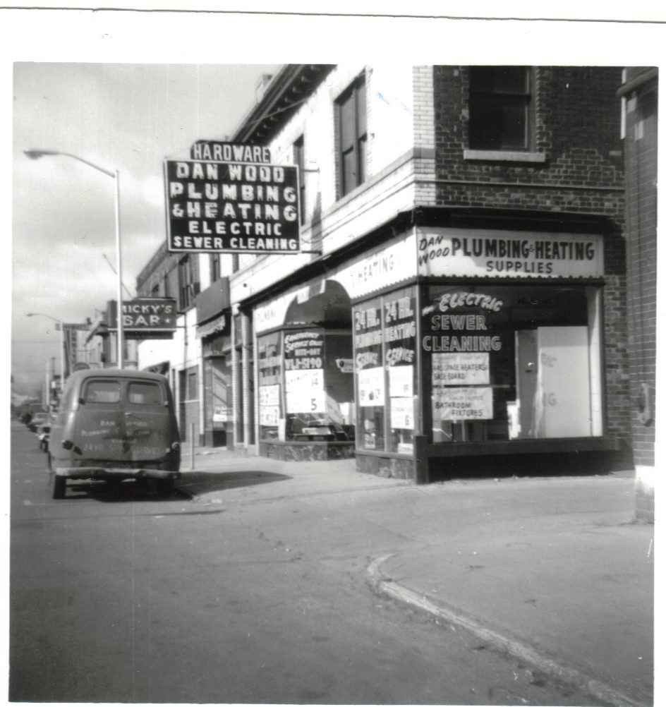 A black and white photo of dan wood plumbing and heating