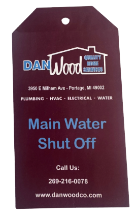 A tag that says main water shut off on it