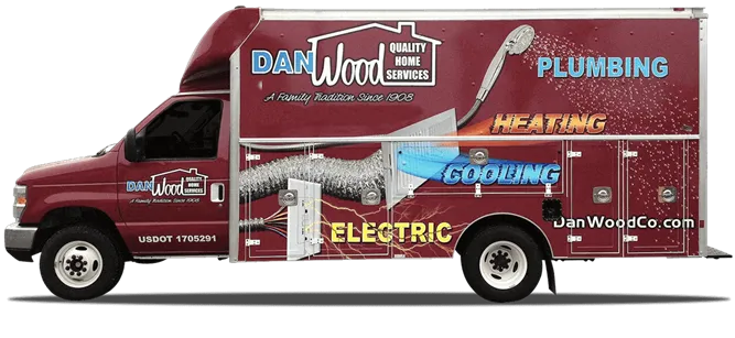 A red van with the word plumbing on it