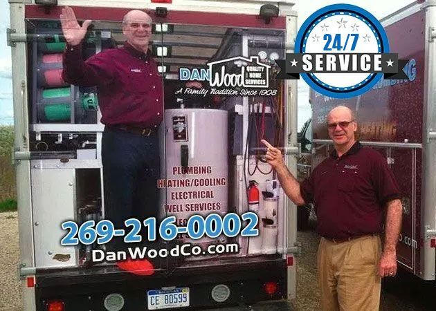 Owner Beside The Service Truck — Portage, MI — Dan Wood Company Owner Beside The Service Truck — Portage, MI — Dan Wood Company