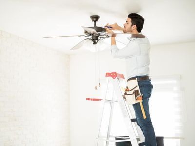 Repairing Ceiling Fan — Portage, MI — Dan Wood Company Repairing Ceiling Fan — Portage, MI — Dan Wood Company