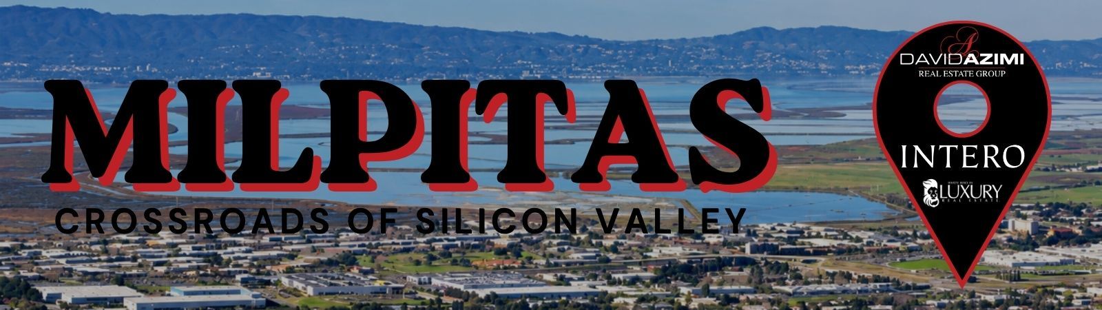 Panoramic aerial view of Milpitas with text “Escape To Milpitas: Uncover Its Beauty” and a red location pin icon