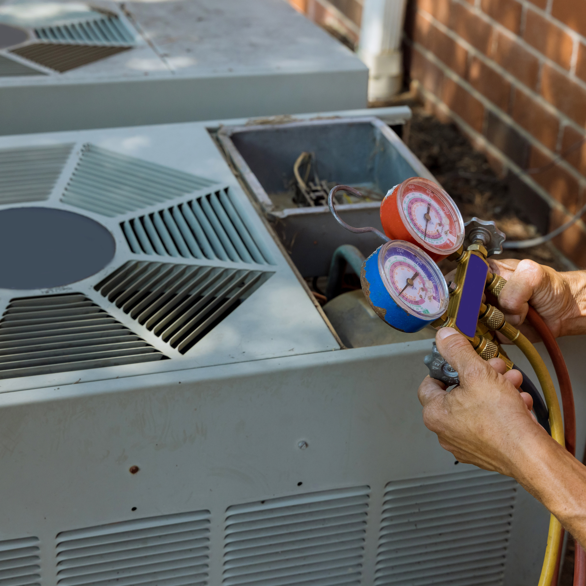 Technician performing furnace maintenance