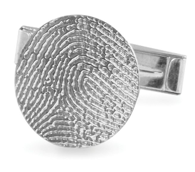 Silver fingerprint-pattern cufflink on a white background