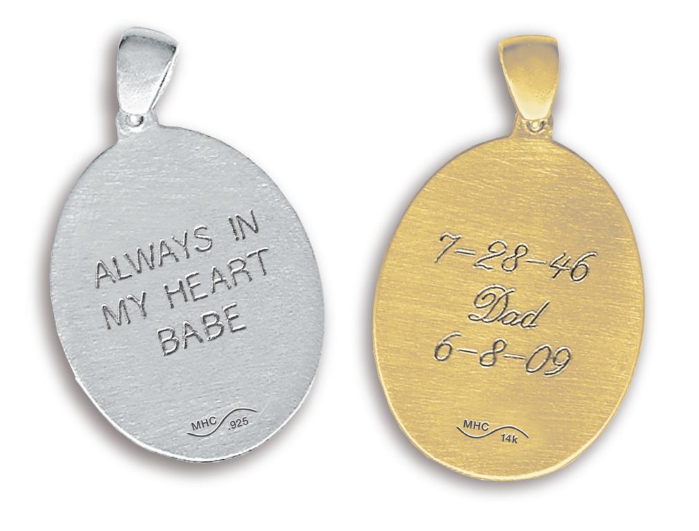 Two oval pendants, silver and gold, engraved with “Always in my heart babe” and “I love you Dad 6-8-00”