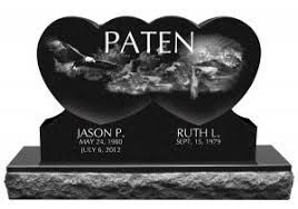 Black granite heart-shaped double memorial with “PATEN” and two engraved names on a stone base