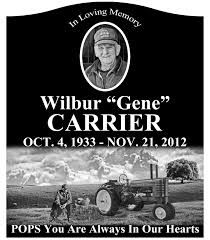 Memorial tribute for Wilbur “Gene” Carrier with portrait, dates, and tractor scene, “Pops You Are Always In Our Hearts”