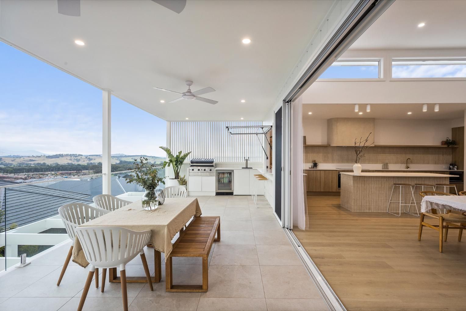There Is a Table and Chairs on The Balcony of A House — Darko's Kitchens in Calderwood, NSW