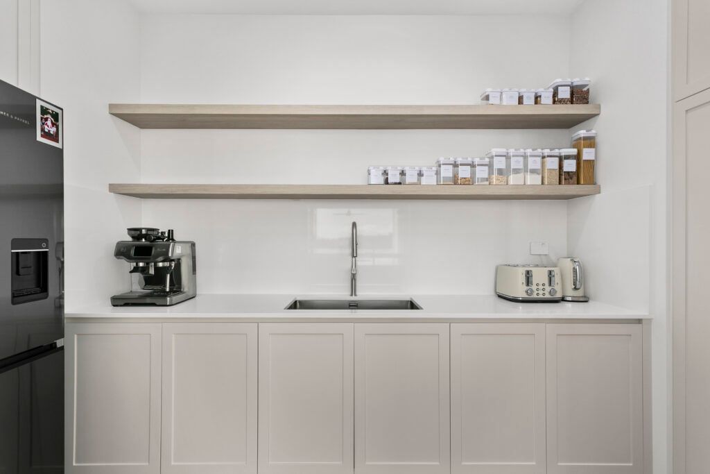 A Kitchen Bench With A Sink, Cupboards and Shelves — Darko's Kitchens in Albion Park Rail, NSW