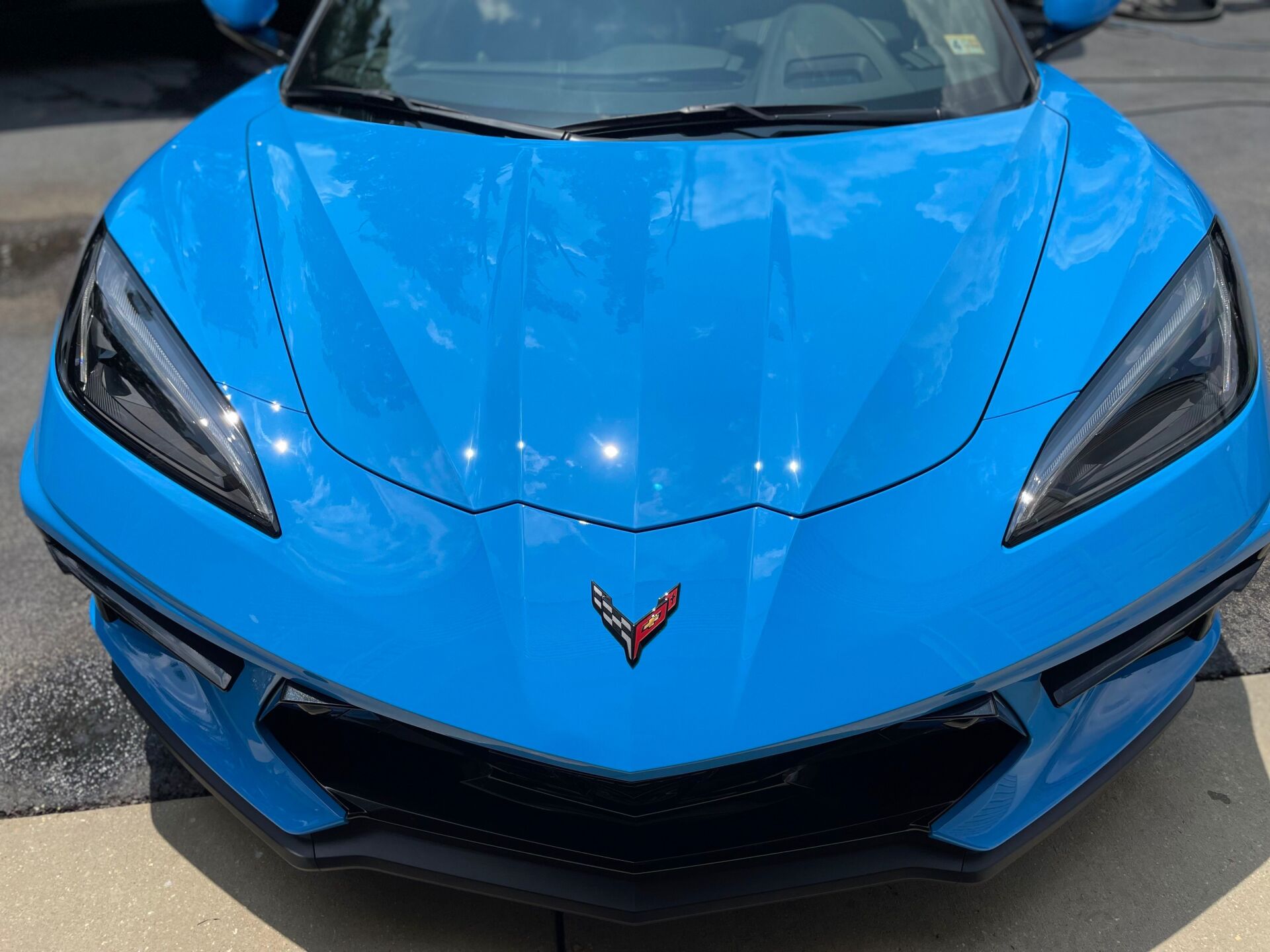 Bright blue Chevrolet Corvette sports car.