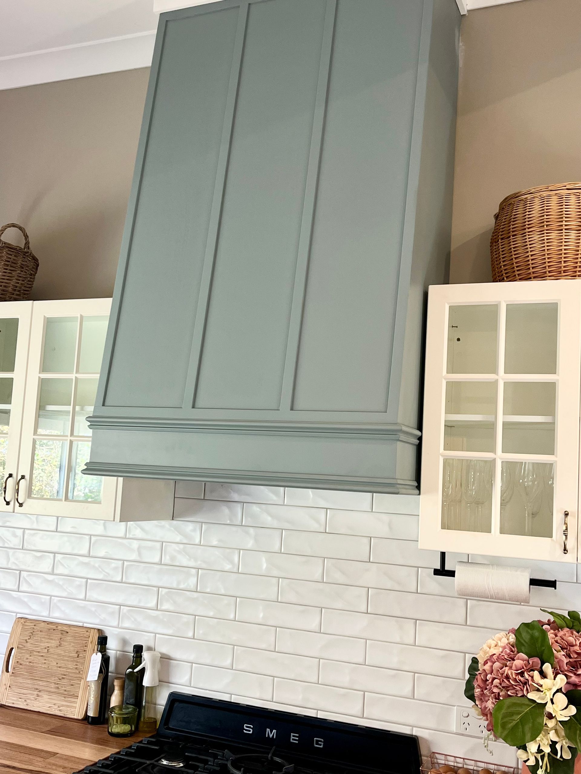 Kitchen With a Pale Blue Vent Hood, White Subway Tile Backsplash — Boyne Building & Renovations in Ponto, NSW