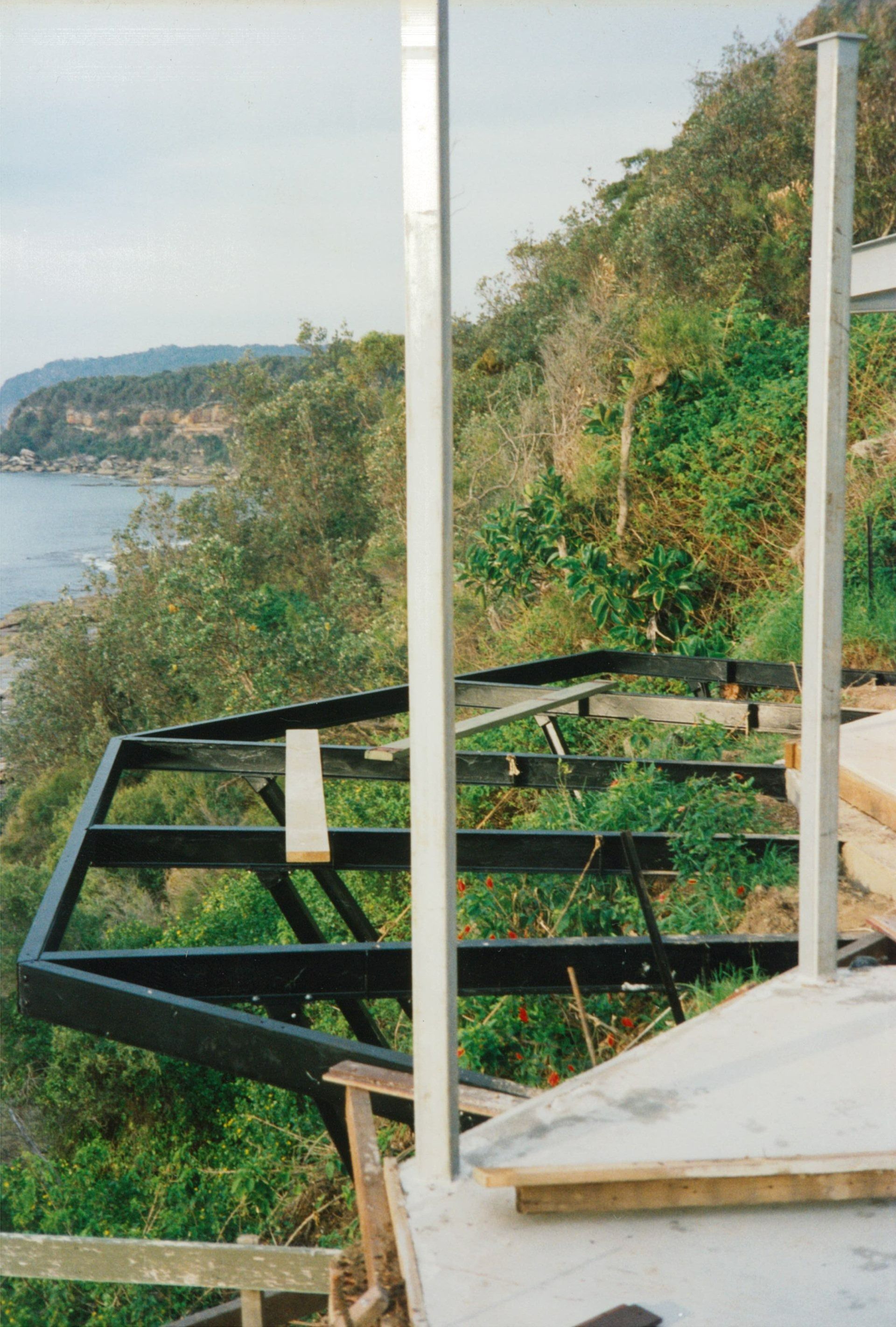 Coastal Hillside with A Black Metal Frame — Boyne Building & Renovations in Ponto, NSW