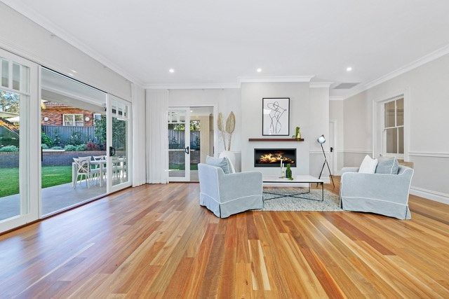 Bright Living Room with Hardwood Floors — Boyne Building & Renovations in Ponto, NSW