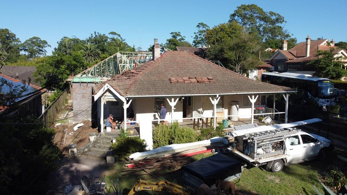 Damaged House with Collapsed Roof — Boyne Building & Renovations in Ponto, NSW