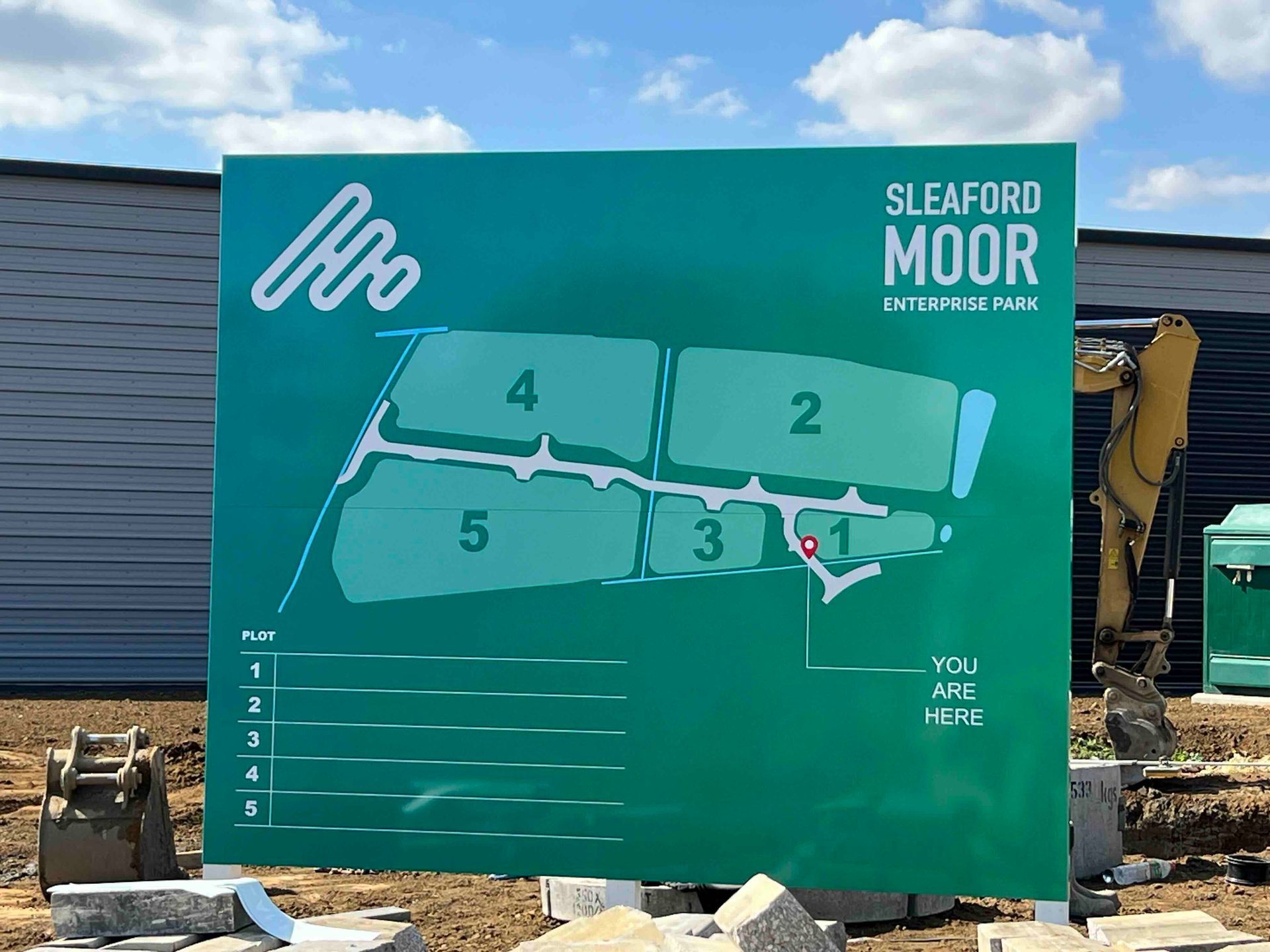 Large site map sign for an enterprise park showing plot layout