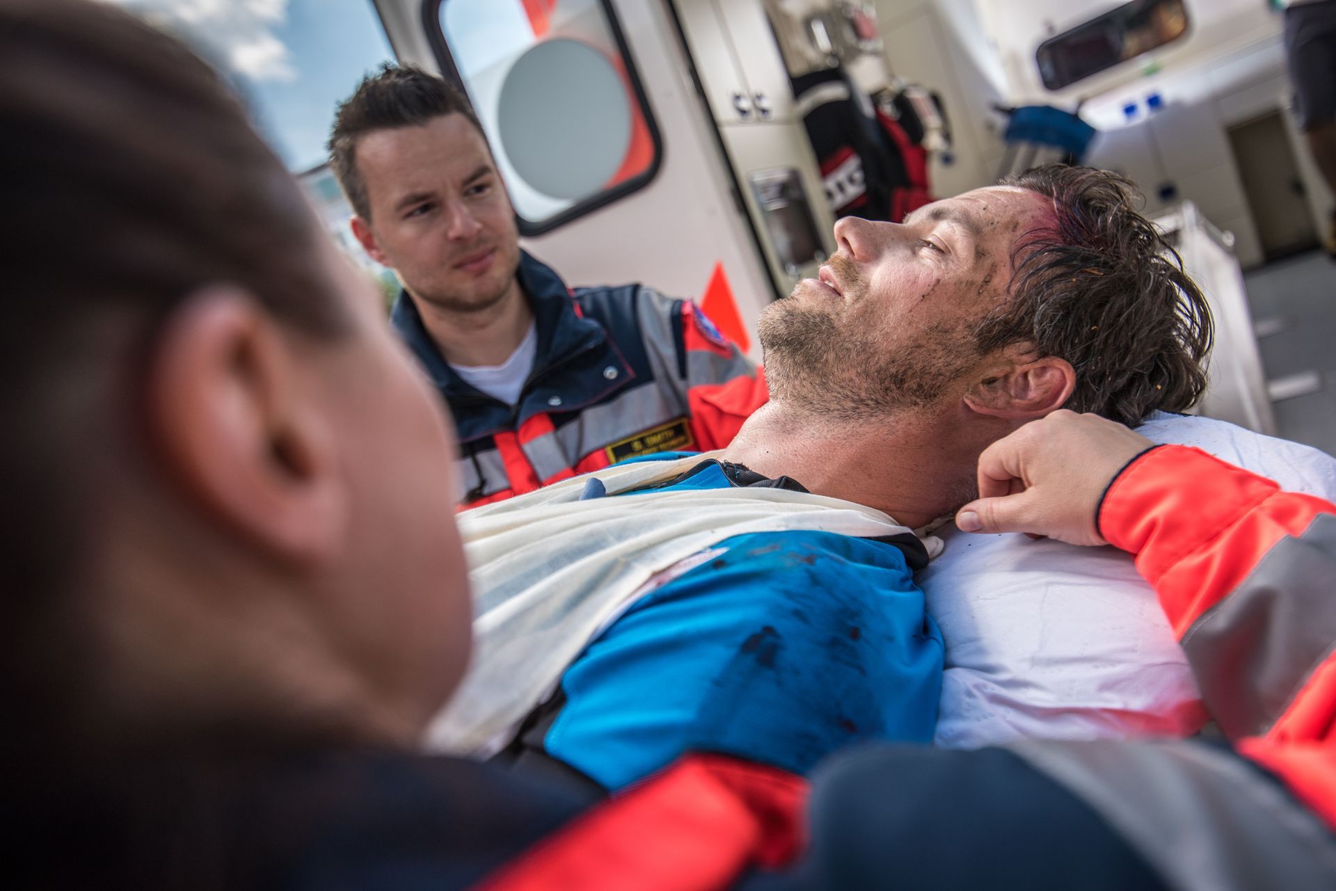Team Pushing Stretcher With Injured Person — Decatur, GA — DeWoskin Law Firm