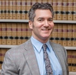 Alex Merrit — Decatur, GA — DeWoskin Law Firm