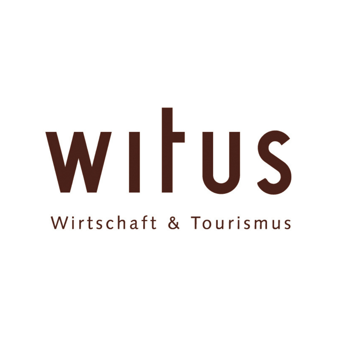 The logo for witus wirtschaft & tourismus is brown and white.