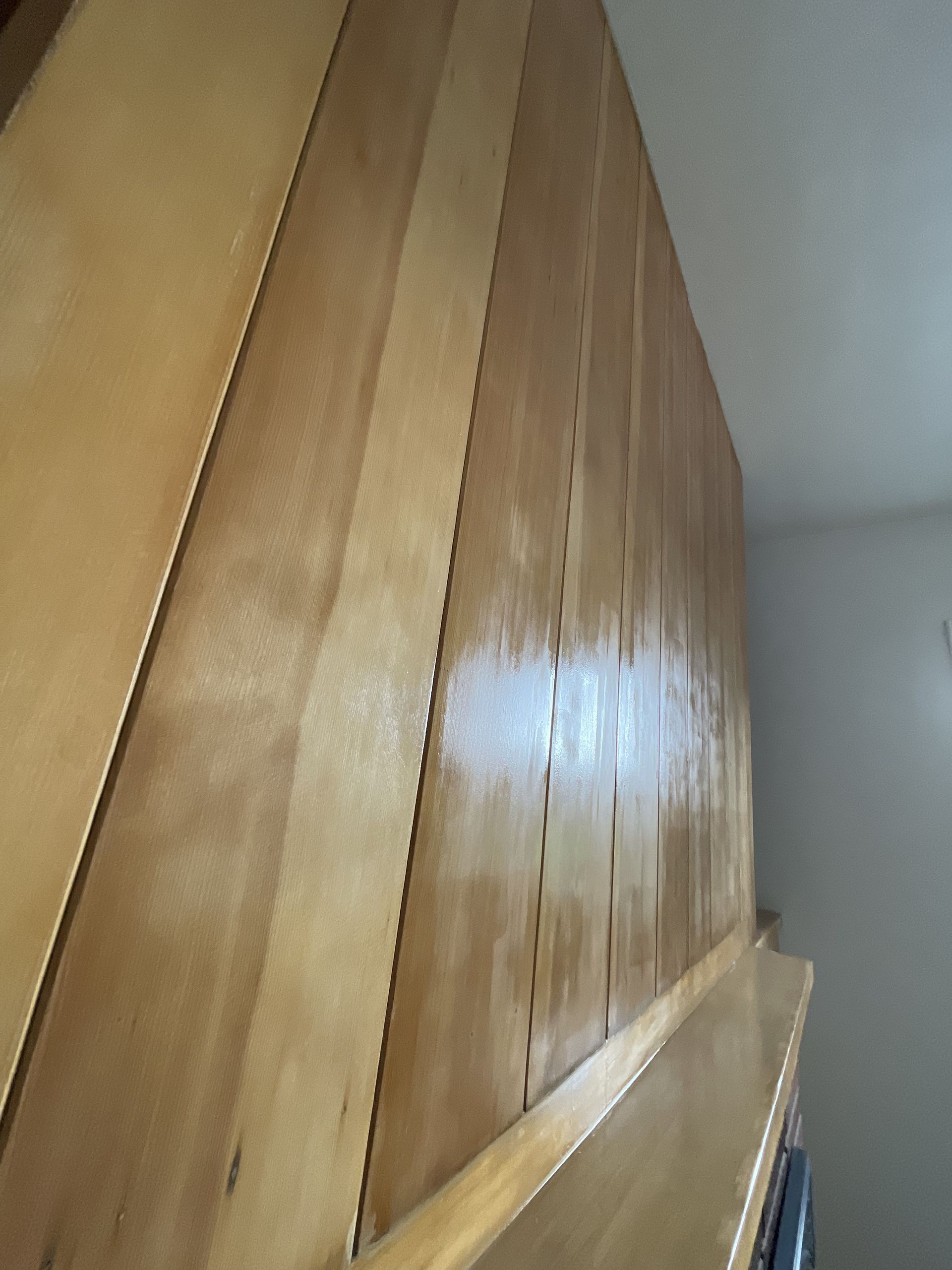 An empty room with hardwood floors and two windows. An empty room with hardwood floors and two windows.