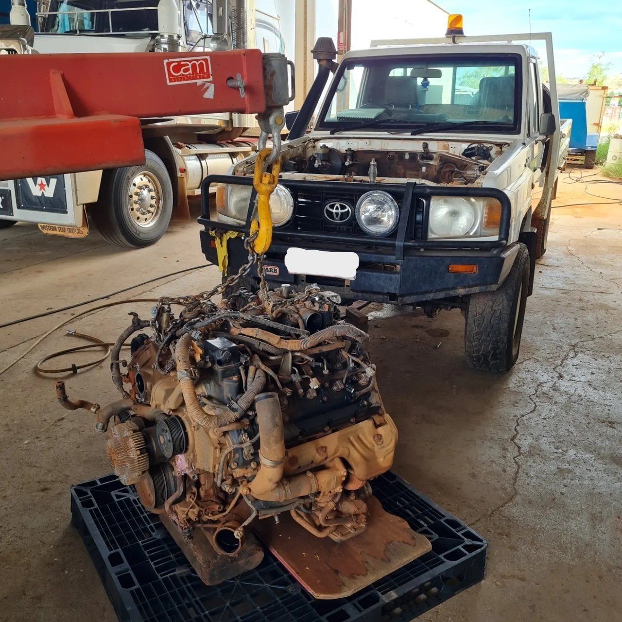 A Toyota Land Cruiser with Its Engine Removed — Central Australian Sidelifter Haulage in Ciccone, NT