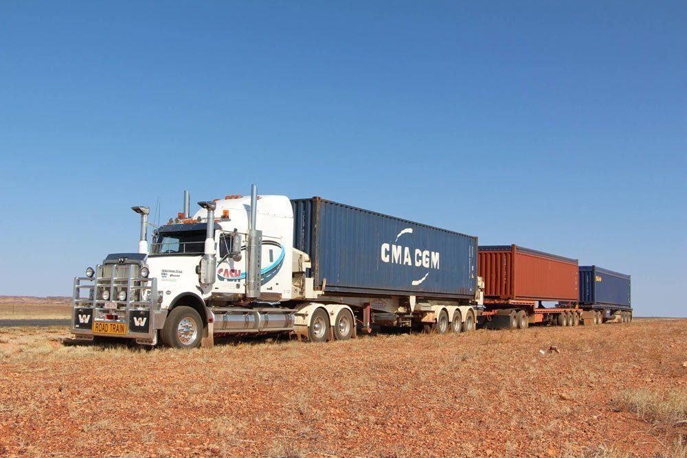 Semi-Truck with Multiple Shipping Containers — Central Australian Sidelifter Haulage in Ciccone, NT
