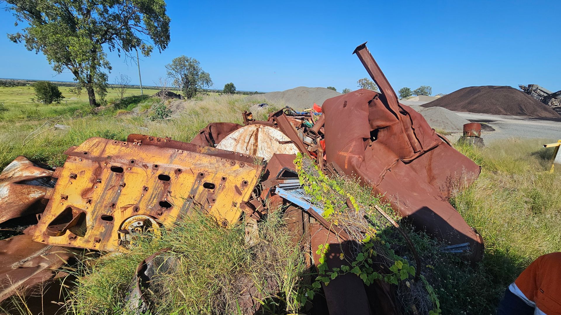 Dirt Clearing With Tire Tracks, Trees in Background, and Blue Sky — NPX Solutions In Gympie, QLD