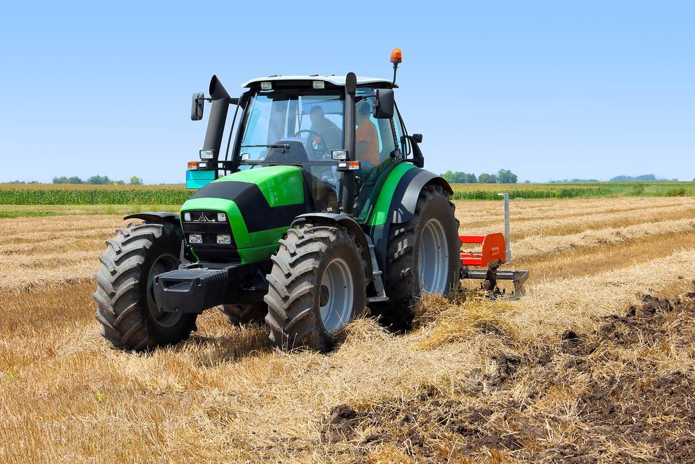 Tractor On The Farmland — O'Brien's Machinery In Maitland