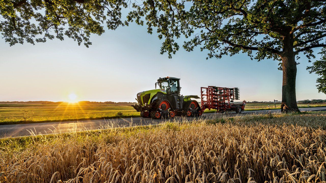 Farmer With Tractor Seeding At Agricultural Farmland — O'Brien's Machinery In Maitland