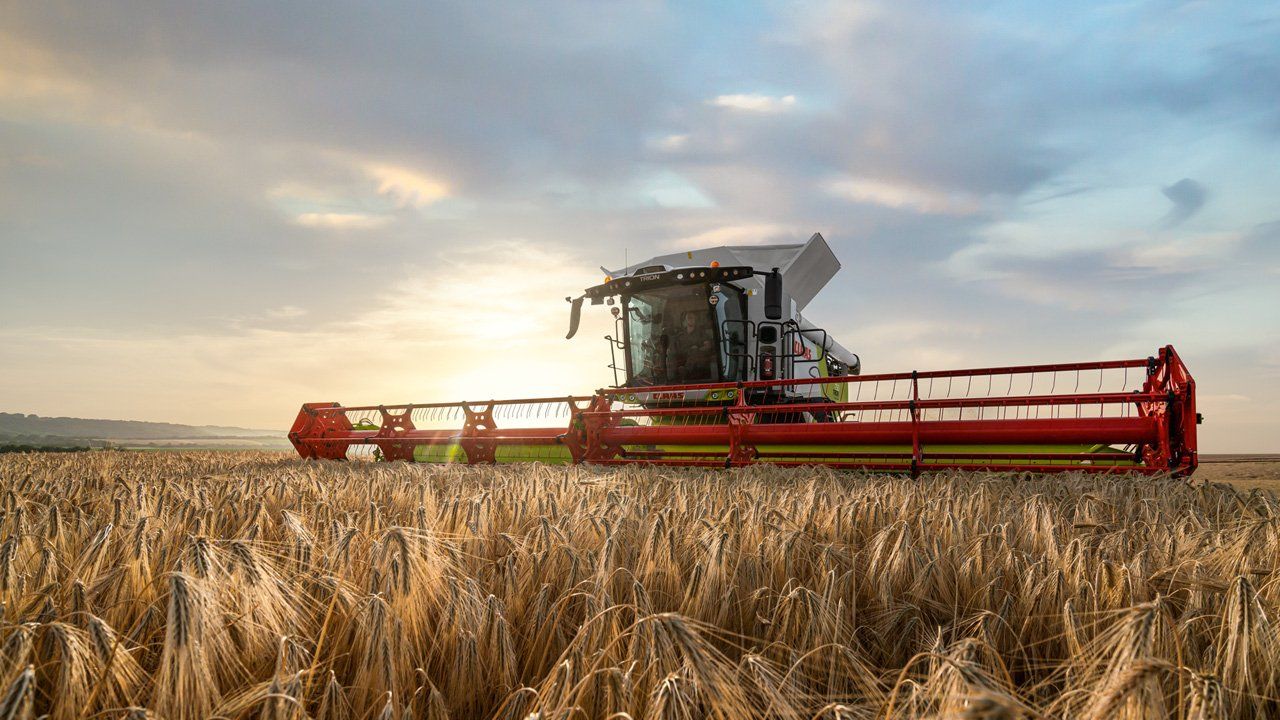 Tractor Spraying Fertilizer — O'Brien's Machinery In Maitland