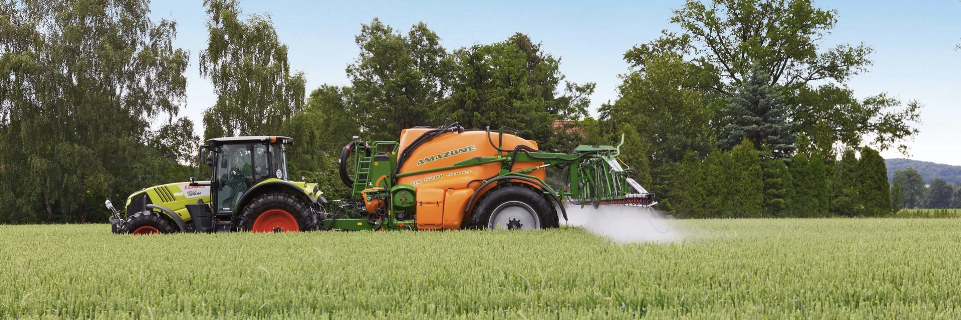 Tractor Spraying Fertilizer — O'Brien's Machinery In Hunter Valley NSW