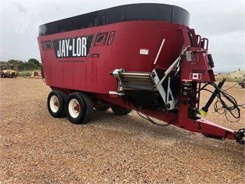 Tractor On The Road With Trailer — O'Brien's Machinery In Hunter Valley NSW