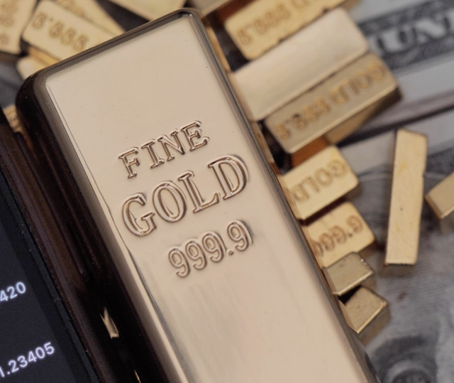 A gold bar that says fine gold 999.9 on it