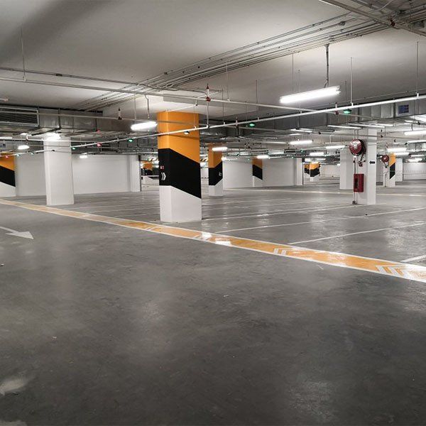 A Parking Garage With A Lot Of Parking Spaces And Columns  — River2Coast Concreting in Grafton, NSW